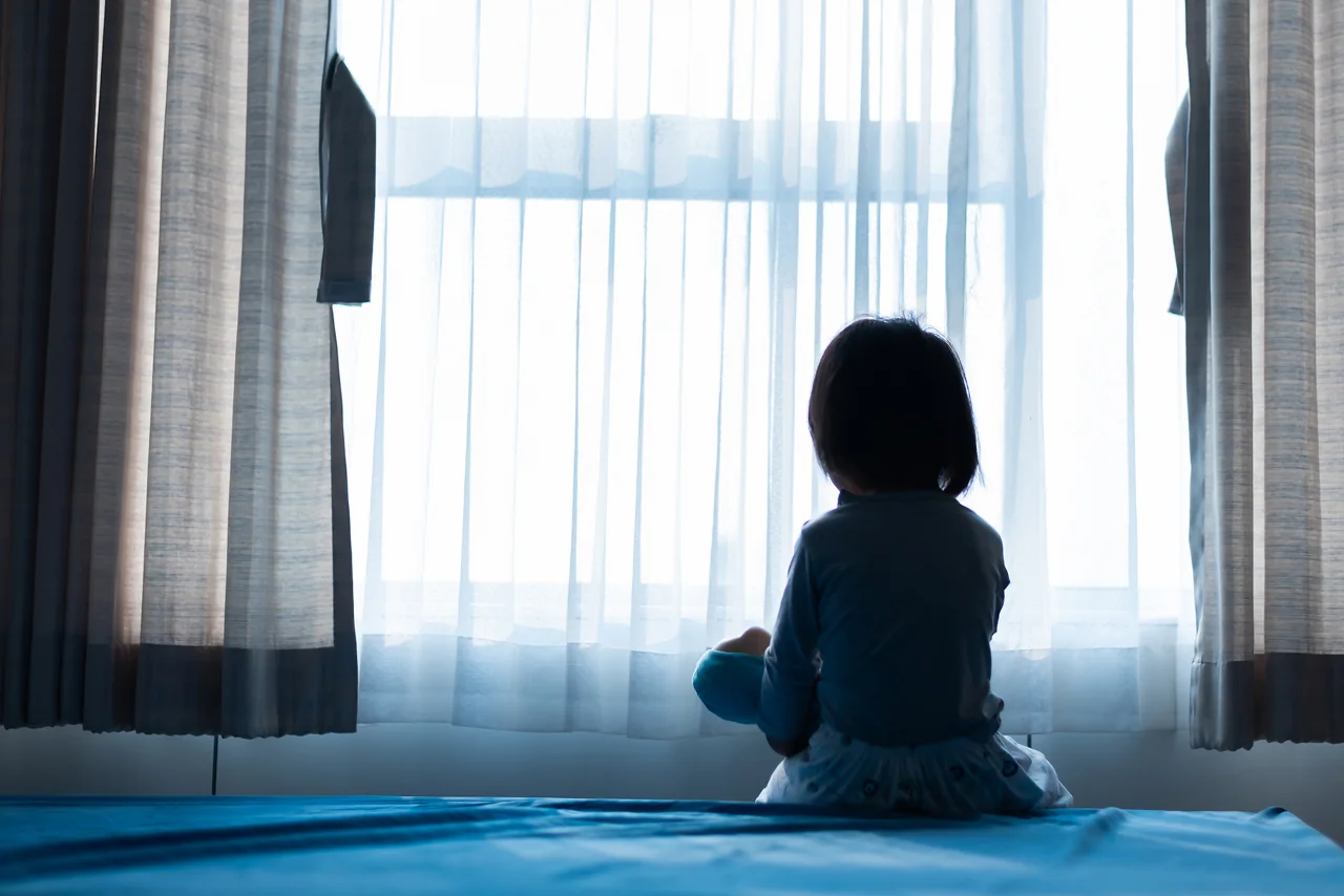 jail time for molestation charges florida little girl and stuffy in dark room looking out window through curtains